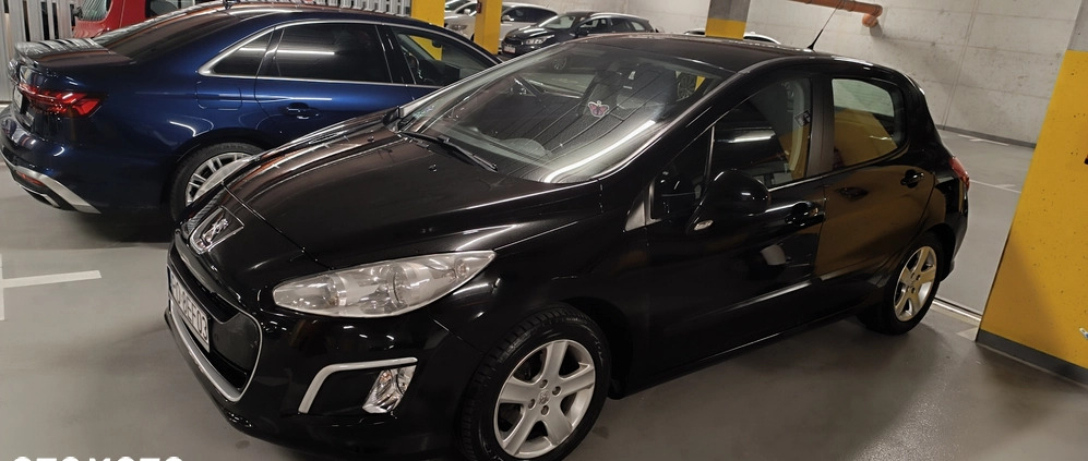 Peugeot 308 cena 18900 przebieg: 214000, rok produkcji 2012 z Poznań małe 277